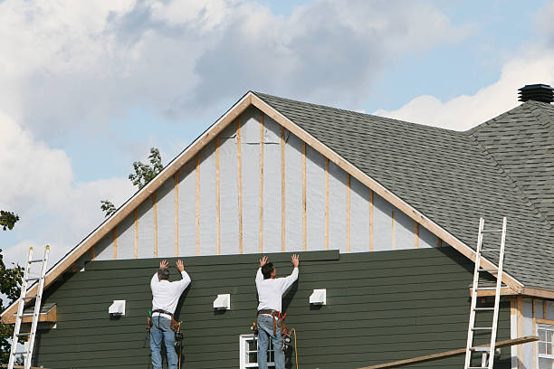 Professional Siding Contractor technician working in Beach City, TX